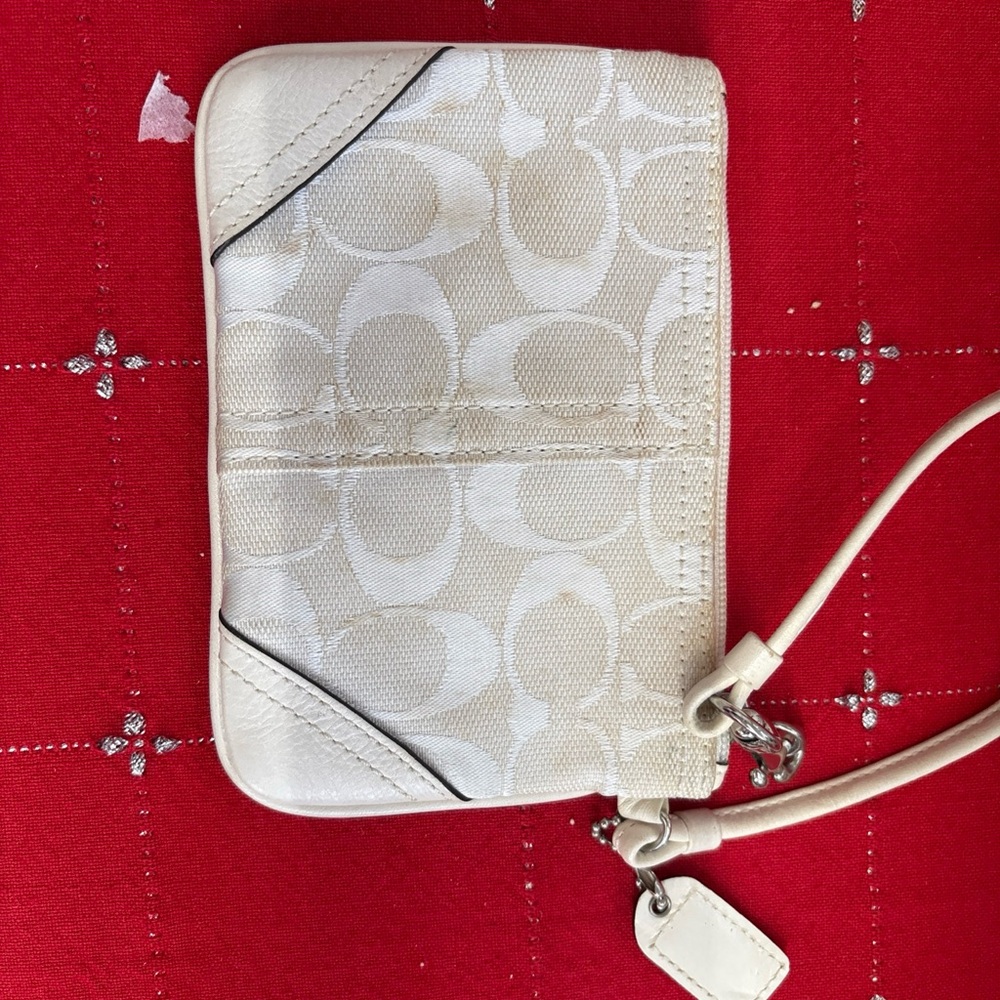 Elegant Coach Cream Wristlet
